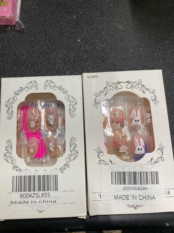 Photo 1 of **2 DIFFERENT PACKS OF EASTER NAILS**Easter Press on Nails Short Square Fake Nails Bunny Flower Glue on Nails Eggs Daisy Bee Floral Design False Nails Pink Nude Glossy Spring Stick on Nail for Women Decor Supplies 24Pcs