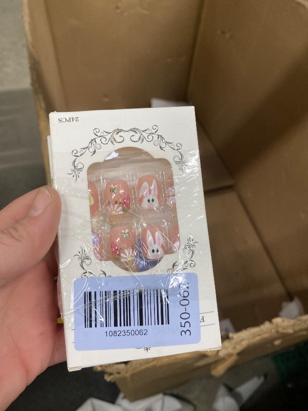 Photo 1 of **2 DIFFERENT PACKS OF EASTER NAILS**Easter Press on Nails Short Square Fake Nails Bunny Flower Glue on Nails Eggs Daisy Bee Floral Design False Nails Pink Nude Glossy Spring Stick on Nail for Women Decor Supplies 24Pcs