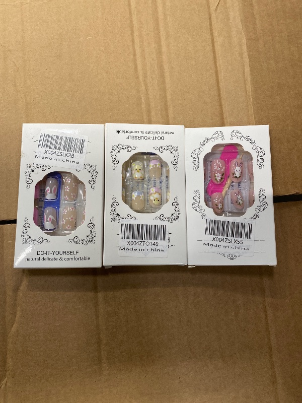 Photo 1 of **3 PACKS OF EASTER NAILS, DIFFERENT DESIGNS** see photos