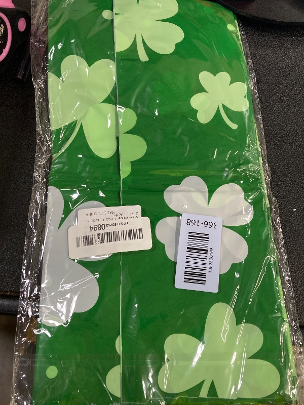 Photo 1 of St Patricks Tablecloths(54x108 Inch) Disposable Plastic Green Clover Tablecloth Spring Table Cloth Cover Shamrock Party Favors Supplies Decorations Home Dinner Kitchen Table Decor Photo Props
