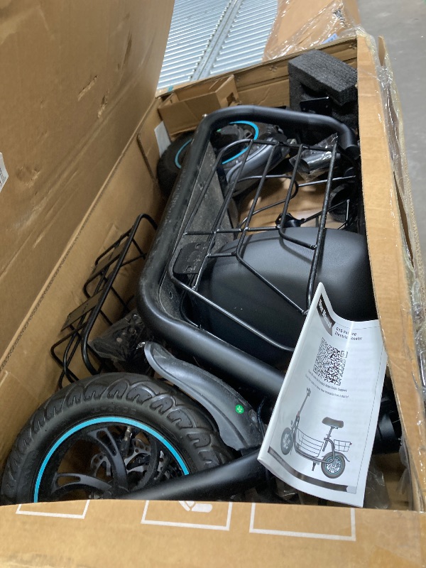 Photo 1 of **It is used; it is unknown whether any parts are missing, and it is unknown whether it functions 100%.****Gyroor C1S Electric Scooter with Seat for Adults - 550W Motor, Pet Basket, 19 MPH Top Speed, 20 Miles Range, 12" Pneumatic Tires, Foldable Commuting