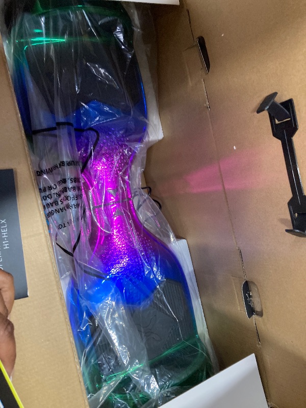 Photo 1 of ***Broken plastic cover***Hover-1 Helix Electric Self Balancing Scooter with 7MPH Top Speed, 4 Mile Range, Dual 200W Motors, 6HR Full-Charge, Built-In Bluetooth Speaker, 6.5” Wheels, Rider Modes: Beginner to Expert***Broken plastic cover***