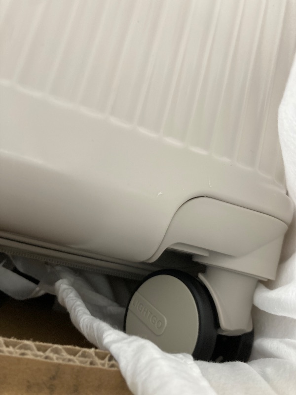 Photo 1 of **NOT IN ORIGINAL BOX**Hanke 20 Inch Expandable Carry on Luggage 22x14x9 Airline Approved Lightweight PC Hard Shell Suitcases with Wheels Travel Luggage Rolling Suitcase Travel Luggage Bag for Weekender(Ivory White) EST VALUE 159.99
