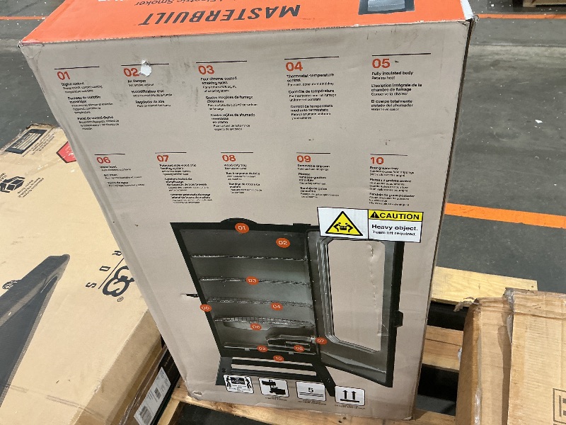 Photo 1 of ***UPDATED 7/4*** Masterbuilt® 40-inch Digital Electric Vertical BBQ Smoker with Leg Kit, Side Wood Chip Loader and 970 Cooking Square Inches in Black, Model MB20070122