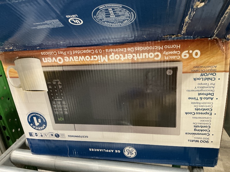 Photo 1 of ***FINAL SALE NO RETURN ***PARTS *** GE Countertop Microwave Oven, Compact 0.9 Cubic Ft., 900-watt Capacity, 7 Auto Cooking Settings, Child-Lock Technology, Kitchen Essentials for The Countertop, Dorm Room or Apartment, Stainless Steel