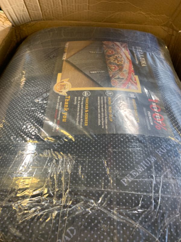 Photo 1 of DELLUNA Non-Slip Area Rug Pad 10'x14', 3/8" Thick Double Side Rubber + Felt, Premium Deluxe Cushioned- Safe for All Floors, Adds Comfort and Protection, Ultra Strong Grip, Stop Rug from Moving.