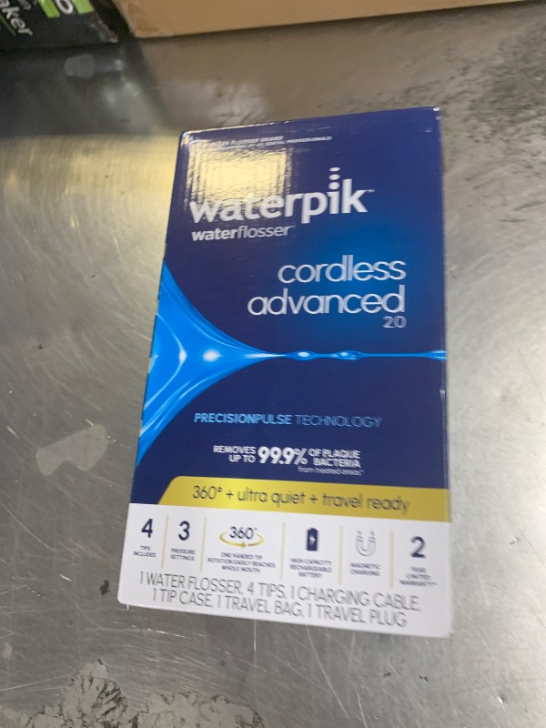 Photo 1 of Waterpik Cordless Advanced 2.0 Water Flosser For Teeth, Gums, Braces, Dental Care With Travel Bag and 4 Tips, ADA Accepted, Rechargeable, Portable, and Waterproof, Gray WP-587, Packaging May Vary