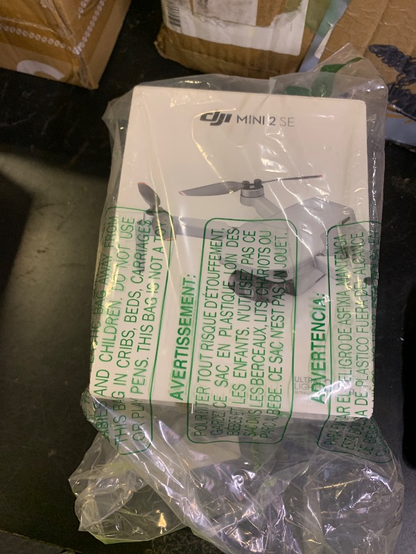 Photo 1 of DJI Mini 2 SE, Lightweight Mini Drone with QHD Video, 10km Max Video Transmission, 31-Min Flight Time, Under 249 g, Auto Return to Home, 3-Axis Gimbal Drone with Camera for Beginners