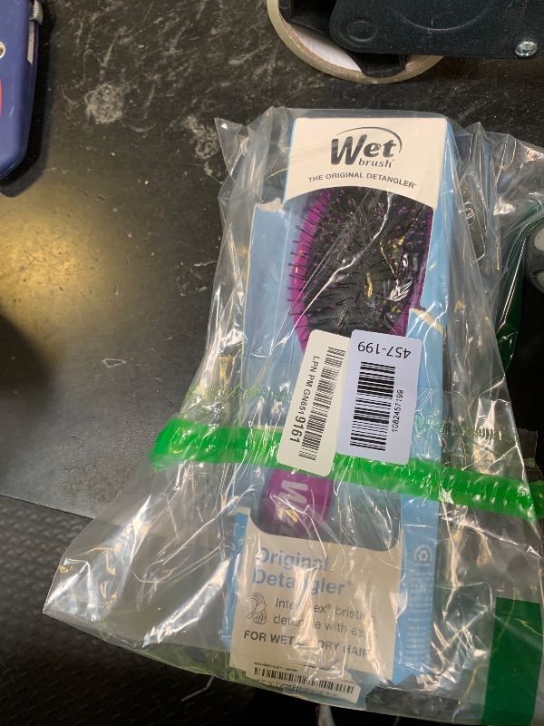 Photo 1 of Wet Brush Original Detangling Hair Brush, Purple, Ultra-Soft IntelliFlex Bristles, Detangler Hairbrush Glides Through Tangles With Ease For All Hair Types, For Women, Men, Wet & Dry Hair