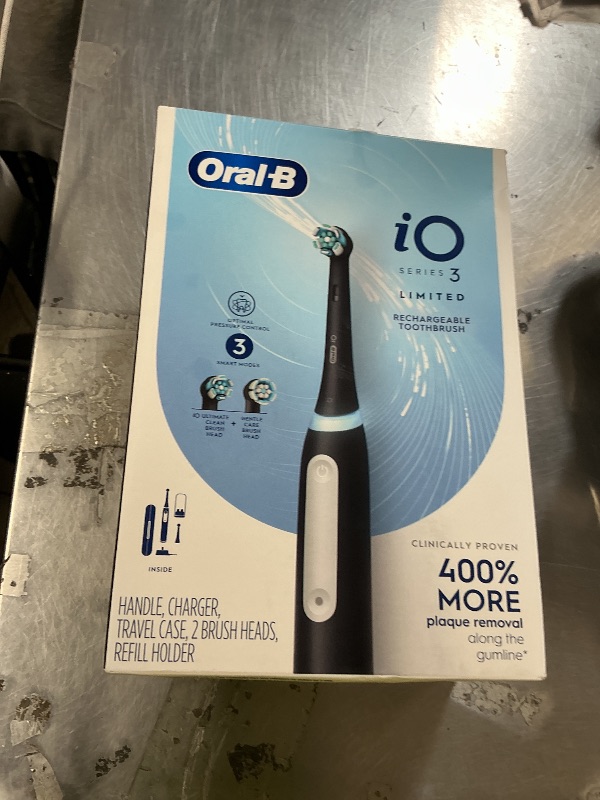 Photo 1 of Oral-B iO Series 3 Limited Deep Clean Rechargeable Electric Toothbrush for Adults, Black, 3 Modes, Smart Pressure Sensor, Plaque Removal and Gum Care, 2 Replacement Brush Heads, Travel Case