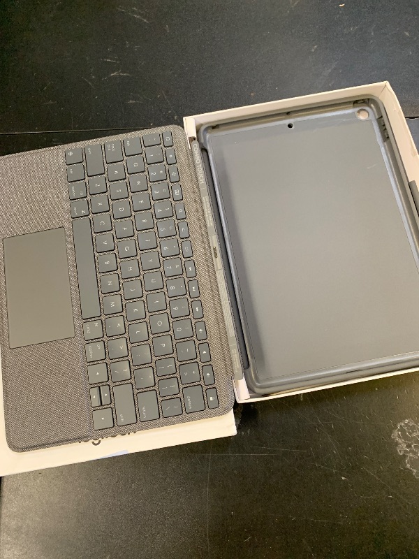 Photo 1 of Logitech Combo Touch for iPad (7th and 8th Generation) Keyboard case with trackpad, Wireless Keyboard, and Smart Connector Technology – Graphite Apple Exclusive