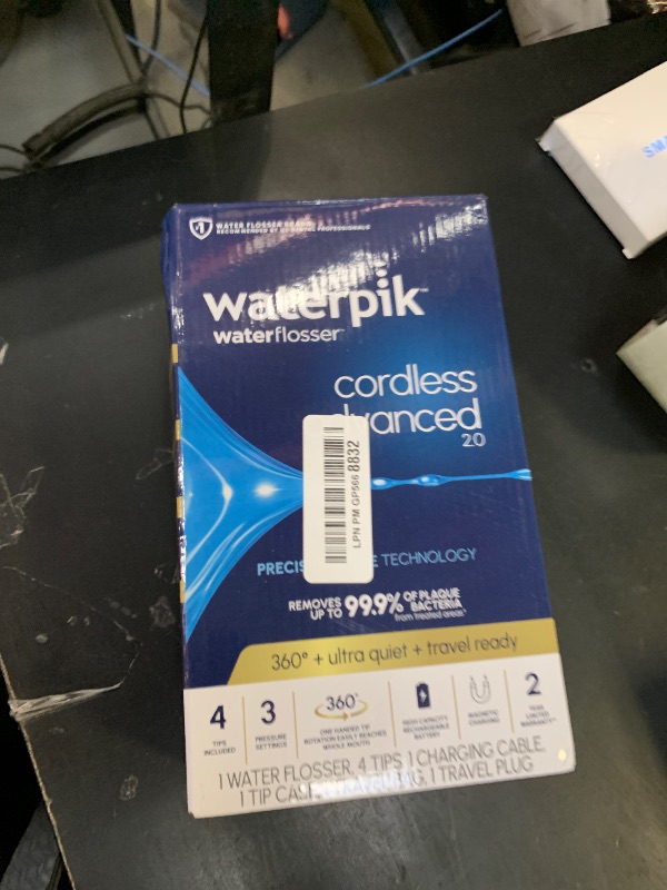Photo 1 of Waterpik Cordless Advanced 2.0 Water Flosser For Teeth, Gums, Braces, Dental Care With Travel Bag and 4 Tips, ADA Accepted, Rechargeable, Portable, and Waterproof, Blue WP-583, Packaging May Vary