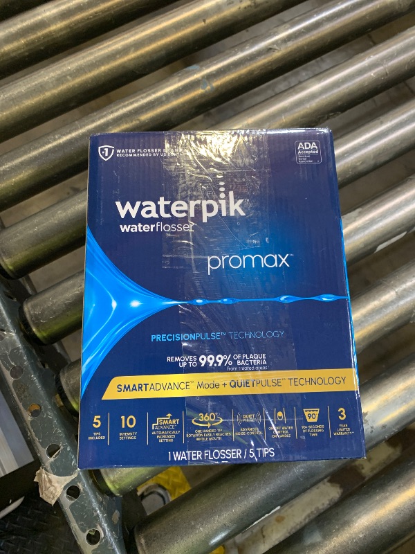 Photo 1 of Waterpik Promax Water Flosser with SmartAdvance Mode for Daily Gum Health and Cleaning Teeth, Braces, Implants, ADA Accepted, Small Quiet Design, Electric Flosser with 10 Settings, 5 Tips, WF-23