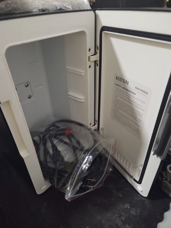 Photo 1 of **FINAL SALE, NO RETURNS, NOT FUNCTIONAL, VIEW NOTES**AstroAI Mini Fridge 2.0 Gen, 6 Liter/8 Cans Compact Small Refrigerator, Makeup Skincare Cooler & Warmer, Energy Efficient & Quiet, 110V AC/12V DC Portable for Bedroom, Car, Office&Dorms (Dark Grey)