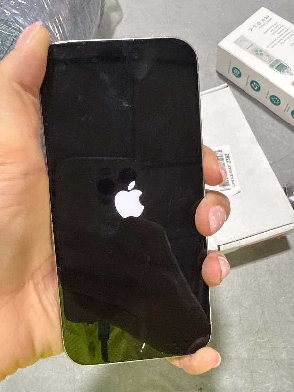 Photo 1 of Apple iPhone 15 Pro, 128GB, White Titanium - Unlocked (Renewed)