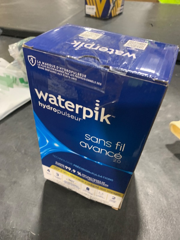 Photo 1 of Waterpik Cordless Advanced 2.0 Water Flosser For Teeth, Gums, Braces, Dental Care With Travel Bag and 4 Tips, ADA Accepted, Rechargeable, Portable, and Waterproof, White WP-580, Packaging May Vary