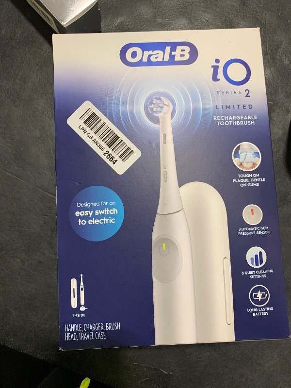 Photo 1 of Oral-B Rechargeable Electric Toothbrush, iO Limited Simple Clean, 3 Cleaning Modes, Automatic Pressure Sensor to Protect Gums, Travel Case, White