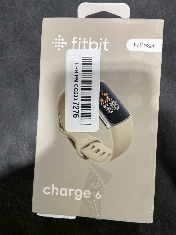 Photo 1 of Fitbit Charge 6 Fitness Tracker with Google Apps - Heart Rate on Exercise Equipment - 3-Month Google Health Premium Membership Included - Health Tools - Porcelain/Silver - Small&Large Bands Included