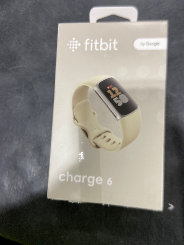 Photo 1 of Fitbit Charge 6 Fitness Tracker with Google Apps - Heart Rate on Exercise Equipment - 3-Month Google Health Premium Membership Included - Health Tools - Porcelain/Silver - Small&Large Bands Included