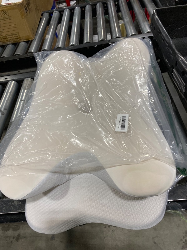 Photo 1 of Cervical Neck Pillow for Pain Relief - Ergonomic Memory Foam Pillows