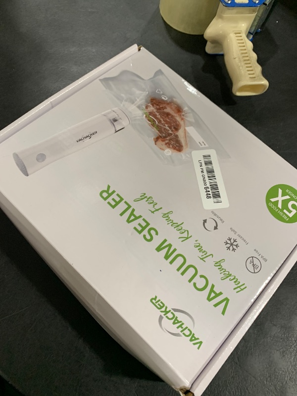 Photo 1 of Vachacker Compact Handheld Vacuum Sealer with 30 Reusable Bags Food Sealer