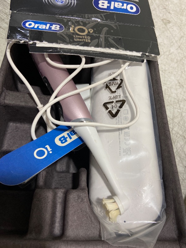 Photo 1 of Oral-B Rechargeable Electric Toothbrush, iO9 Limited Ultimate Clean, 7 Cleaning Modes, Interactive Display, iSense Charger, Charging Travel Case, Visible Pressure Sensor, 3 Brush Heads, Rose Quartz