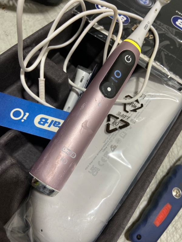 Photo 1 of Oral-B Rechargeable Electric Toothbrush, iO9 Limited Ultimate Clean, 7 Cleaning Modes, Interactive Display, iSense Charger, Charging Travel Case, Visible Pressure Sensor, 3 Brush Heads, Rose Quartz