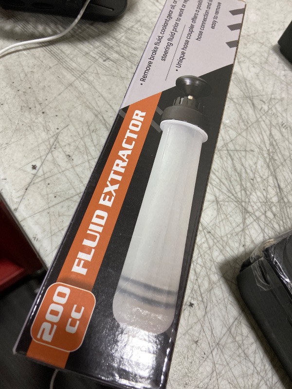 Photo 1 of FOUR UNCLES Fluid Transfer Syringe with Flexible Hose for Oil Service