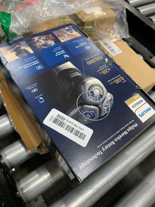 Photo 1 of Philips Norelco Shaver i9000, Wet & Dry Electric Shaver, Ink Black, SenseIQ Technology, Triple Lift & Cut System, 360 Rotating Dual SteelPrecision Precision Blades, Nose Trimmer, Model X9000/90
