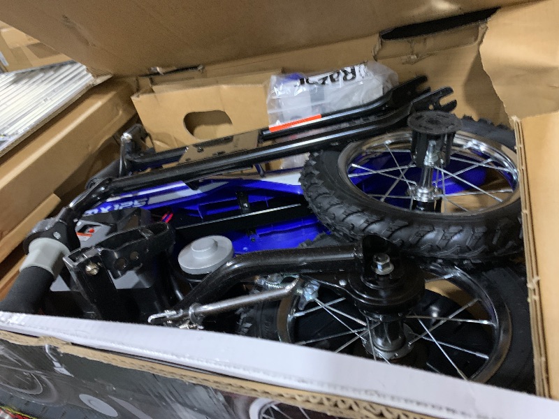 Photo 1 of Razor MX125 Dirt Rocket Electric-Powered Bike with Authentic Motocross Geometry, Rear-Wheel Drive,100-watt, high-Torque, Chain-Driven Motor, for Kids 7+, Blue