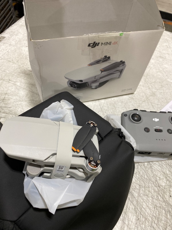 Photo 1 of DJI Mini 4K Fly More Combo, Drone with 4K UHD Camera for Adults, Under 249 g, 3-Axis Gimbal Stabilization, 10km Video Transmission, Auto Return, 3 Batteries for 93-Min Max Flight Time, QuickShots