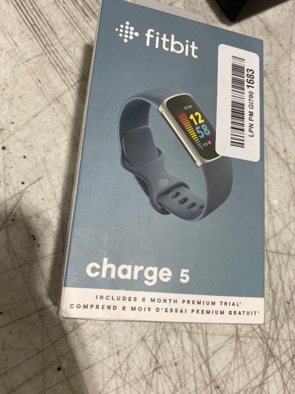 Photo 1 of Fitbit Charge 5 Advanced Fitness Tracker with GPS, Heart Rate, Sleep & Health Tracker - Power Bundle with Adapter (Blue Stainless Steel)