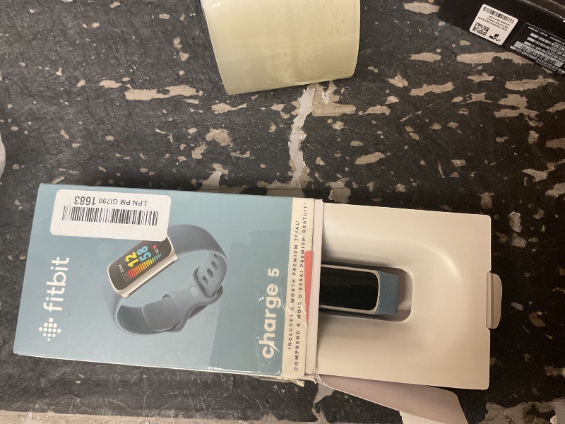 Photo 1 of Fitbit Charge 5 Advanced Fitness Tracker with GPS, Heart Rate, Sleep & Health Tracker - Power Bundle with Adapter (Blue Stainless Steel)
