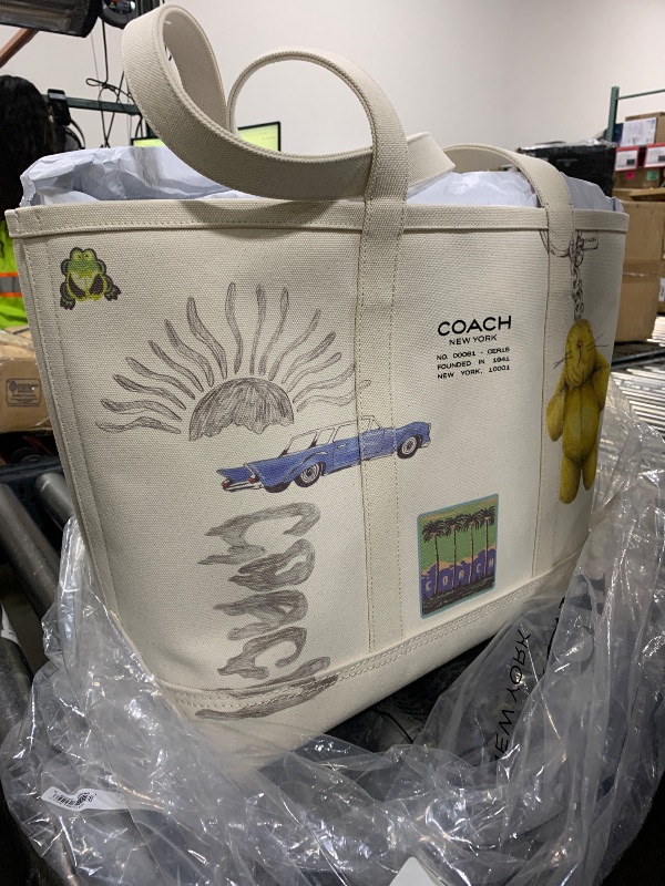 Photo 1 of Coach Utility Tote