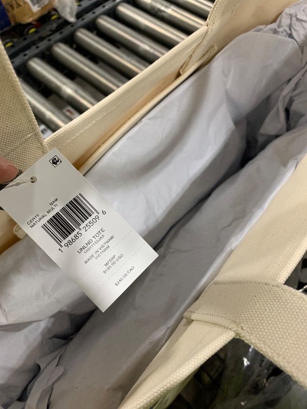 Photo 1 of Coach Utility Tote