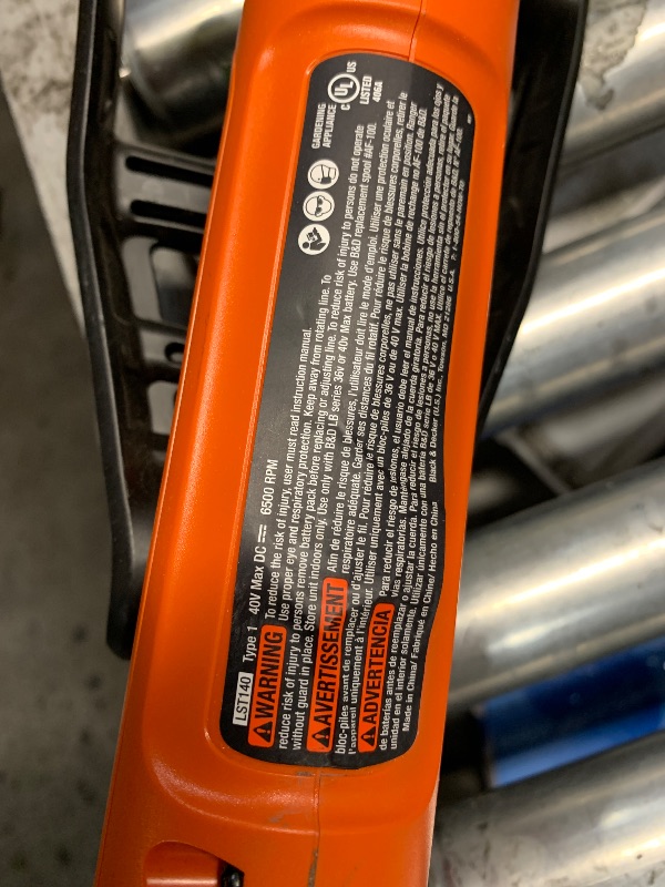 Photo 1 of **NON FUNCTIONAL**(FOR PARTS ONLY)
Black+Decker 40V MAX 13 Inch String Trimmer and Lawn Edger with Battery and Charger, Cordless Weed Eater with Charge Indicator, High Torque PowerDrive Technology (LST140C)