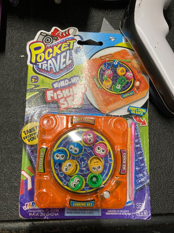 Photo 1 of [NEW] Pocket Travel Wind Up Fishing Game