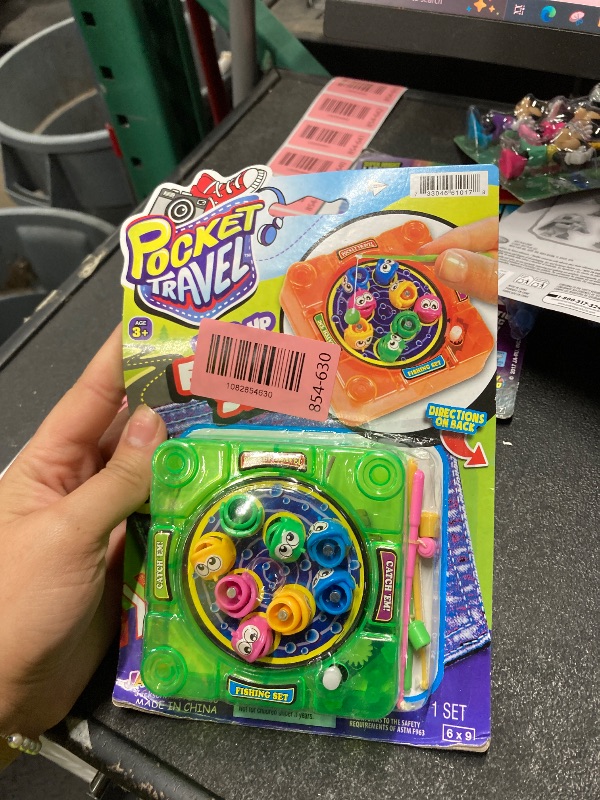 Photo 1 of [NEW] Pocket Travel Wind Up Fishing Game