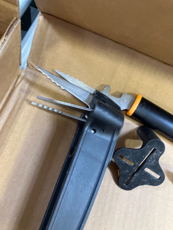 Photo 1 of Fiskars Stand-Up Weed Puller Tool, 4 Serrated Stainless Steel Claws Grip Roots for Permanent Removal, Reinforced Foot Platform Penetrates Tough Soil, Easy-Eject & Ergonomic Offset Handle, 39"