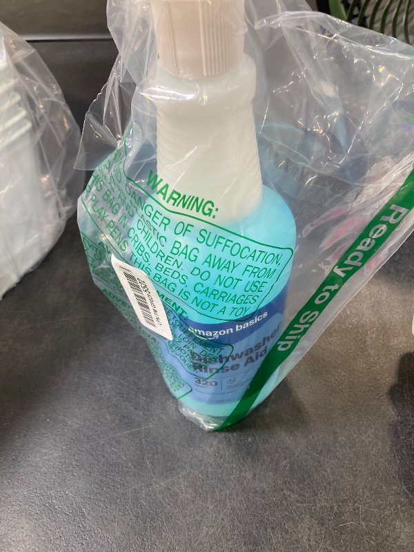 Photo 1 of Amazon Basics Dishwasher Rinse Aid Liquid, Prevents Spots, Enhances Drying, Sparkling Finish, 32 Fl Oz, 1-Pack