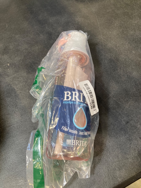 Photo 1 of Brita Hard-Sided Plastic Premium Filtering Water Bottle, BPA-Free, Reusable, Replaces 300 Plastic Water Bottles, Filter Lasts 2 Months or 40 Gallons, Includes 1 Filter, Blush - 26 oz