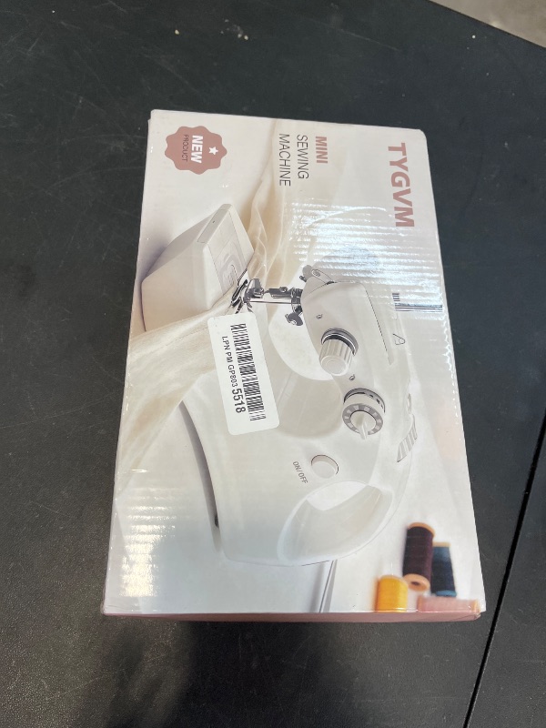 Photo 1 of Portable Cordless Handheld Sewing Machine, 2 Modes for Two-Thread Stitching. Ideal Sewing Machine for Beginners. Mini for Home, Travel, DIY, Mending (Bright White)