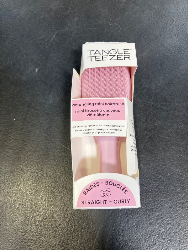 Photo 1 of Tangle Teezer Ultimate Detangler Brush, Eliminates Knots & Reduces Breakage, Travel-Size Mini Hair Brush for Straight to Wavy Hair Types, Millennial Pink