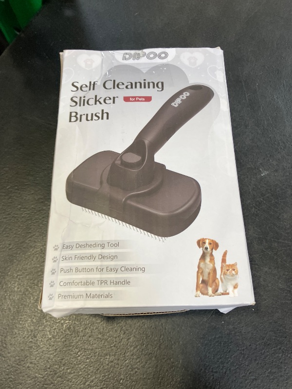 Photo 1 of Dipoo Self Cleaning Shedding Brush - Skin Friendly Grooming Tool for Dogs, Cats, and Puppies, Deshedding and Hair Removal for Long and Short Haired Pets, Black