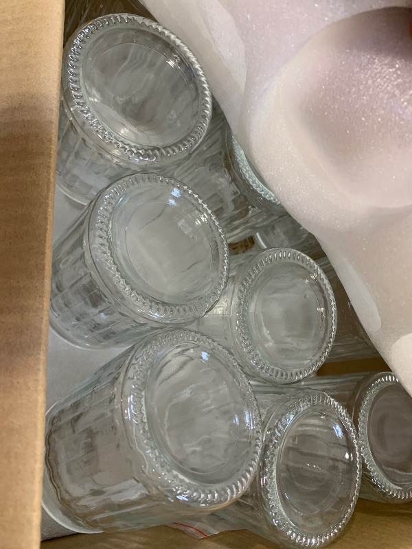 Photo 1 of Nicunom 24 Pcs Glass Bud Vases Set, Small Vintage Ribbed Bud Vase in Bulk Decorative Vases Clear Mini Flower Vase for Centerpiece, Table Decorations, Wedding Reception, Home Decor, and Events