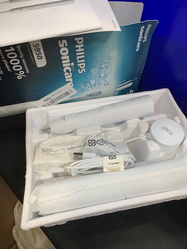 Photo 1 of Philips Sonicare 5950 Series Electric Toothbrush, with Pressure Sensor, for Sensitive Gums, 6 Brushing Settings, SmarTimer, BrushPacer, 21-Day Runtime, Travel Case, White, HX7130/03