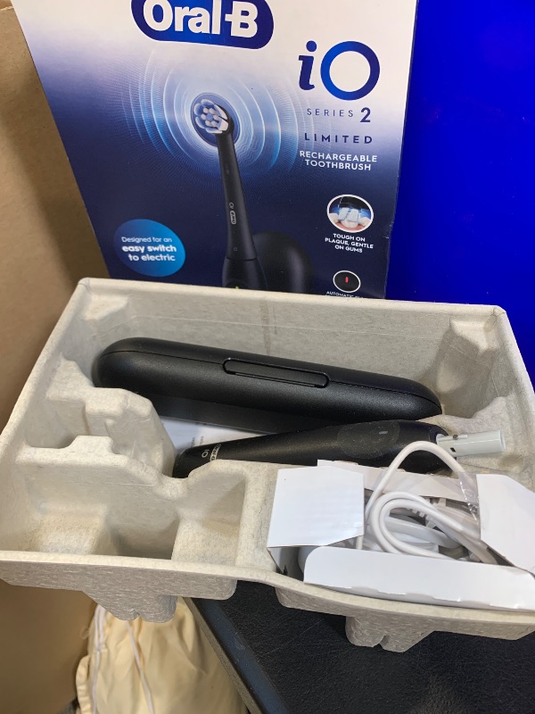 Photo 1 of Oral-B iO Series 2 Limited Simple Clean Rechargeable Electric Toothbrush for Adults, Night Black, 3 Modes, Automatic Pressure Sensor for Gum Care, Travel Case