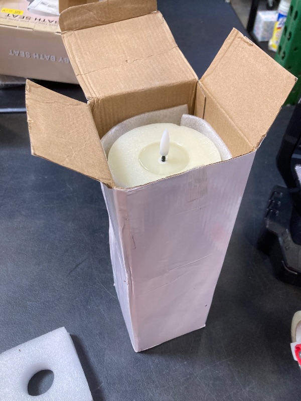 Photo 1 of Wroxipel 4" x12" Flameless Flickering Remote Ivory Candle with Candle Grease and Timer, LED Battery Operated Fake Real Wax 3D-Wick Pillar Candle, Pack of 1