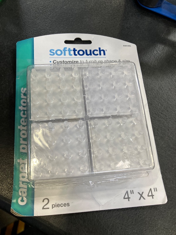 Photo 1 of SoftTouch 4" Adhesive Anti-Dent Carpet Protectors, Set of 2, Clear