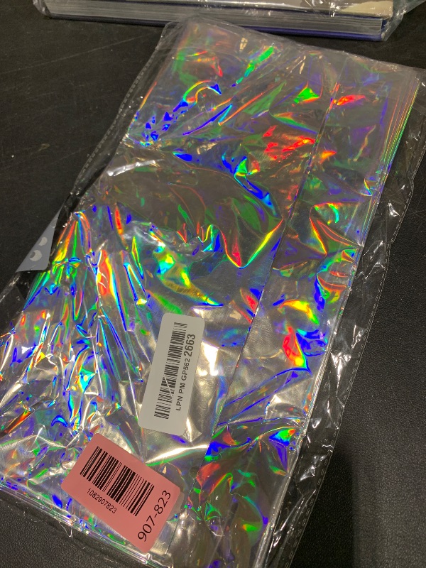 Photo 1 of NKPDAXM 3 Pack Iridescent Tablecloths, Shiny Disposable Foil Plastic Holographic Table Covers for Rainbow Disco Bachelorette Bridal Wedding Party Decorations, 54" x 108"